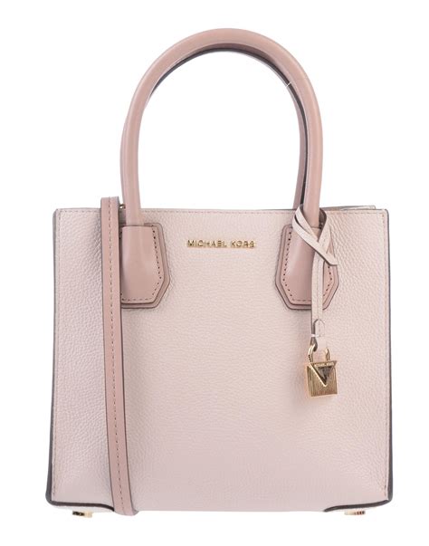 michael kors light pink and brown bag oval